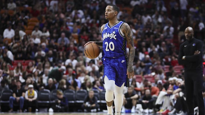 Jan 12, 2024; Miami, Florida, USA; Orlando Magic guard Markelle Fultz (20) dribbles the basketball against the Miami Heat during the third quarter at Kaseya Center. 