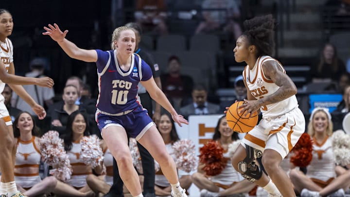 Mar 31, 2025; Birmingham, AL, USA; TCU Horned Frogs guard Hailey Van Lith (10) defends against Texas Longhorns guard Rori Harmon (3) during the second half of an Elite 8 NCAA Tournament basketball game at Legacy Arena. Mandatory Credit: Vasha Hunt-Imagn Images