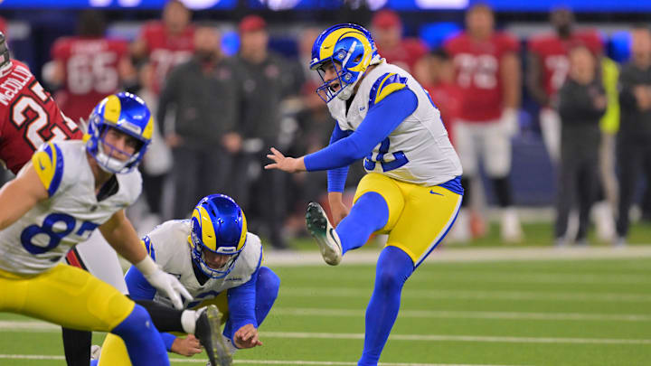 Nov 23, 2025; Inglewood, California, USA; Los Angeles Rams placekicker Harrison Mevis (92) kicks a forty-yard field goal held by punter Ethan Evans (42) against the Tampa Bay Buccaneers during the second quarter at SoFi Stadium. Mandatory Credit: Jayne Kamin-Oncea-Imagn Images Nov 23, 2025; Inglewood, California, USA; Los Angeles Rams placekicker Harrison Mevis (92) kicks a forty-yard field goal held by punter Ethan Evans (42) against the Tampa Bay Buccaneers during the second quarter at SoFi Stadium. Mandatory Credit: Jayne Kamin-Oncea-Imagn Images
