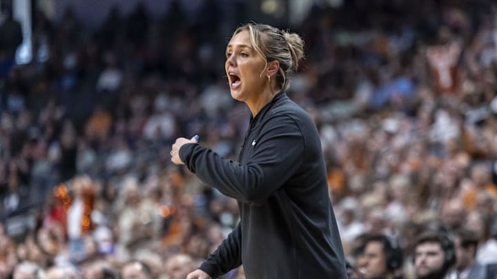 Mar 29, 2025; Birmingham, AL, USA; Tennessee Lady Vols head coach Kim Caldwell works with her team during the first half of a Sweet 16 NCAA Tournament basketball game against the Texas Longhorns at Legacy Arena. Mandatory Credit: Vasha Hunt-Imagn Images Mar 29, 2025; Birmingham, AL, USA; Tennessee Lady Vols head coach Kim Caldwell works with her team during the first half of a Sweet 16 NCAA Tournament basketball game against the Texas Longhorns at Legacy Arena. Mandatory Credit: Vasha Hunt-Imagn Images