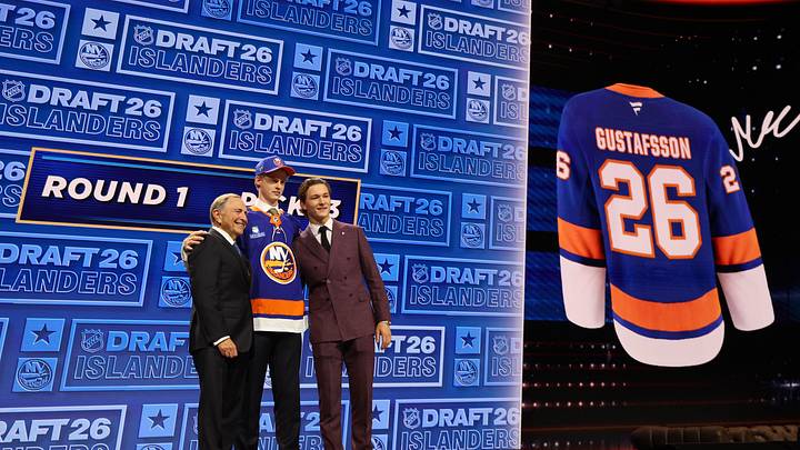 Jun 26, 2026; Buffalo, New York, USA; Malte Gustafsson reacts beside NHL commissioner Gary Bettman and New York Islanders player Matthew Schaefer after being selected with the thirteenth pick in the first round of the 2026 NHL Draft by the Islanders at KeyBank Center. Mandatory Credit: Timothy T. Ludwig-Imagn Images