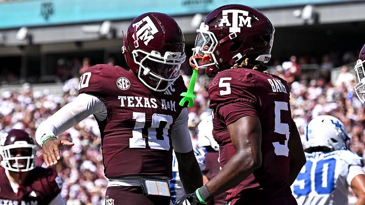 Sep 19, 2026; College Station, Texas, USA; Texas A&M Aggies running back Carsyn Baker (5) celebrates with quarterback Marcel Reed (10) after scoring a touchdown during the second quarter against the Kentucky Wildcats at Kyle Field. Mandatory Credit: Maria Lysaker-Imagn Images Sep 19, 2026; College Station, Texas, USA; Texas A&M Aggies running back Carsyn Baker (5) celebrates with quarterback Marcel Reed (10) after scoring a touchdown during the second quarter against the Kentucky Wildcats at Kyle Field. Mandatory Credit: Maria Lysaker-Imagn Images