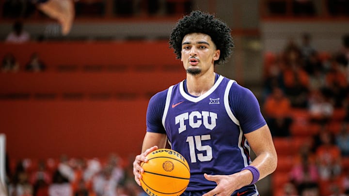 Feb 14, 2026; Stillwater, Oklahoma, USA; TCU Horned Frogs forward David Punch (15) sets the play during the second half against the Oklahoma State Cowboys at Gallagher-Iba Arena. Mandatory Credit: William Purnell-Imagn Images