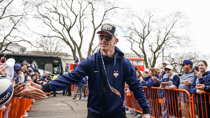 Apr 13, 2024; Hartford, CT, USA; UConn Huskies head coach Dan Hurley is greeted by fans as he and his team arrive at the State Capitol before teams NCAA Mens Basketball Championship victory parade. Mandatory Credit: David Butler II-USA TODAY Sports