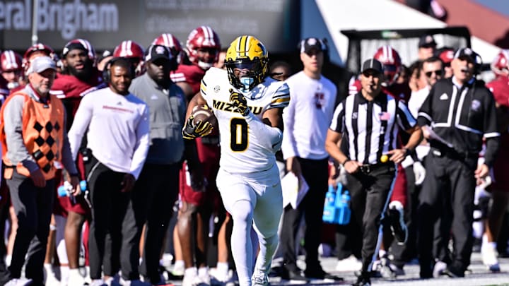 Oct 12, 2024; Amherst, Massachusetts, USA; Missouri Tigers wide receiver Joshua Manning (0) runs the ball against the Massachusetts Minutemen during the second half at Warren McGuirk Alumni Stadium. Mandatory Credit: Eric Canha-Imagn Images Oct 12, 2024; Amherst, Massachusetts, USA; Missouri Tigers wide receiver Joshua Manning (0) runs the ball against the Massachusetts Minutemen during the second half at Warren McGuirk Alumni Stadium. Mandatory Credit: Eric Canha-Imagn Images