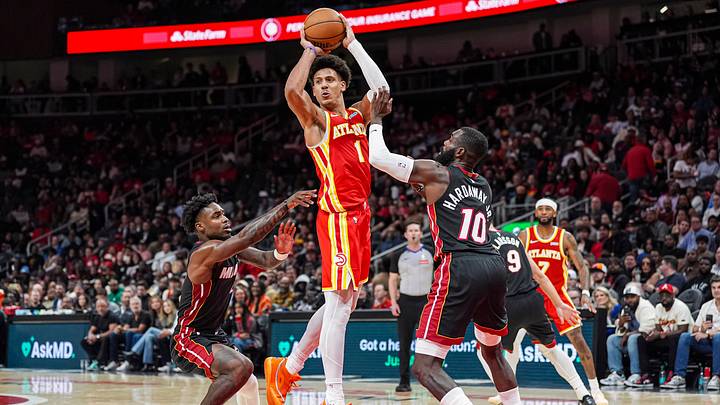 Oct 28, 2026; Atlanta, Georgia, USA; Atlanta Hawks forward Jalen Johnson (1) looks to pass against Miami Heat guards Davion Mitchell (2) and Tim Hardaway Jr. (10) during the second half at State Farm Arena. Mandatory Credit: Dale Zanine-Imagn Images Oct 28, 2026; Atlanta, Georgia, USA; Atlanta Hawks forward Jalen Johnson (1) looks to pass against Miami Heat guards Davion Mitchell (2) and Tim Hardaway Jr. (10) during the second half at State Farm Arena. Mandatory Credit: Dale Zanine-Imagn Images