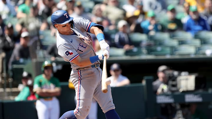 Apr 16, 2026; West Sacramento, California, USA; Texas Rangers third baseman Josh Jung (6) hits a two-run home run against the Athletics during the seventh inning at Sutter Health Park. Mandatory Credit: Dennis Lee-Imagn Images