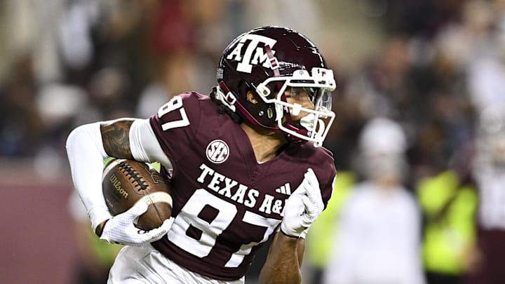 Nov 16, 2024; College Station, Texas, USA; Texas A&M Aggies wide receiver Ashton Bethel-Roman (87) runs the ball during the second half against the New Mexico State Aggies at Kyle Field. Mandatory Credit: Maria Lysaker-Imagn Images Nov 16, 2024; College Station, Texas, USA; Texas A&M Aggies wide receiver Ashton Bethel-Roman (87) runs the ball during the second half against the New Mexico State Aggies at Kyle Field. Mandatory Credit: Maria Lysaker-Imagn Images