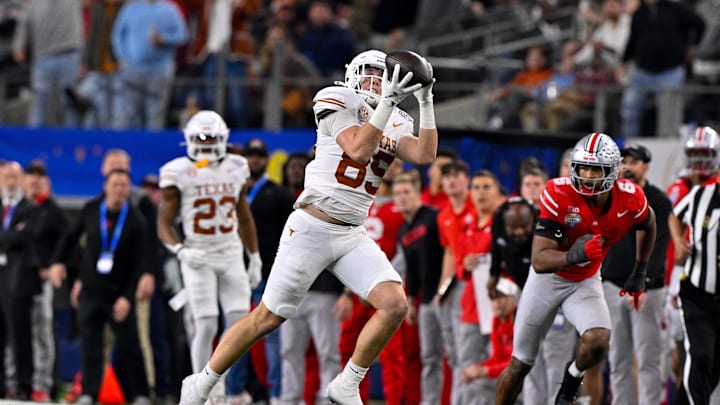 Jan 10, 2025; Arlington, TX, USA; Texas Longhorns tight end Gunnar Helm (85) in action during the game between the Texas Longhorns and the Ohio State Buckeyes at AT&T Stadium. Mandatory Credit: Jerome Miron-Imagn Images Jan 10, 2025; Arlington, TX, USA; Texas Longhorns tight end Gunnar Helm (85) in action during the game between the Texas Longhorns and the Ohio State Buckeyes at AT&T Stadium. Mandatory Credit: Jerome Miron-Imagn Images