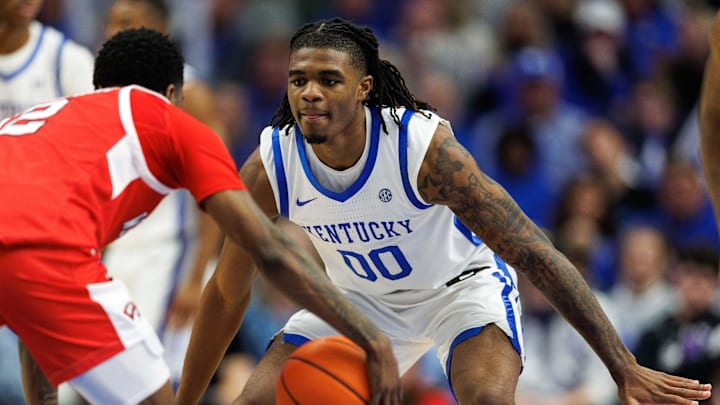 Nov 26, 2024; Lexington, Kentucky, USA; Kentucky Wildcats guard Otega Oweh (00) defends during the second half against the Western Kentucky Hilltoppers at Rupp Arena at Central Bank Center. Mandatory Credit: Jordan Prather-Imagn Images Nov 26, 2024; Lexington, Kentucky, USA; Kentucky Wildcats guard Otega Oweh (00) defends during the second half against the Western Kentucky Hilltoppers at Rupp Arena at Central Bank Center. Mandatory Credit: Jordan Prather-Imagn Images