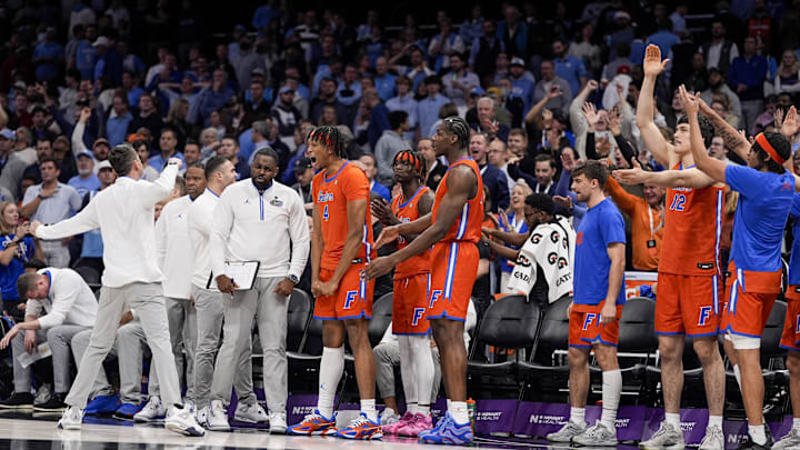 Dec 17, 2024; Charlotte, North Carolina, USA; Florida Gators head coach Todd Golden reacts against the North Carolina Tar Heels during the second half at Spectrum Center. Mandatory Credit: Jim Dedmon-Imagn Images