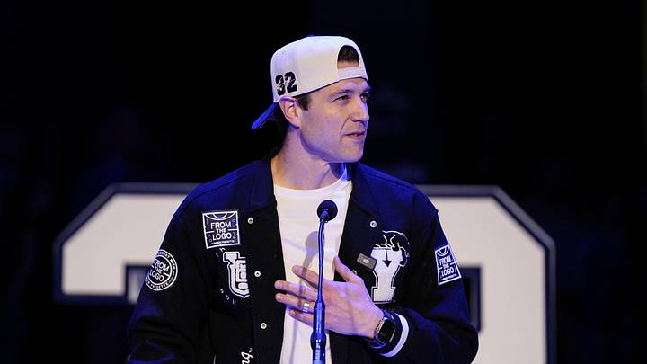 Feb 14, 2026; Provo, Utah, USA; Former BYU Cougars player Jimmer Fredette speaks to the crowd at halftime of a game against the Colorado Buffaloes during a number retirement ceremony at the Marriott Center. Mandatory Credit: Aaron Baker-Imagn Images