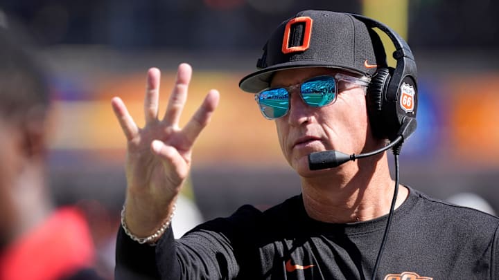 Oklahoma State interim coach Doug Meacham gestures during a college football game between the Oklahoma State Cowboys (OSU) and the Houston Cougars at Boone Pickens Stadium in Stillwater, Okla., Saturday, Oct. 11, 2025. Houston won 39-17. Oklahoma State interim coach Doug Meacham gestures during a college football game between the Oklahoma State Cowboys (OSU) and the Houston Cougars at Boone Pickens Stadium in Stillwater, Okla., Saturday, Oct. 11, 2025. Houston won 39-17.