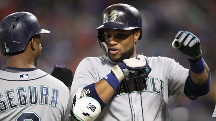 Seattle Mariners second baseman Robinson Cano (22) celebrates with shortstop Jean Segura (2) after hitting a three-run home run during the fifth inning against the Texas Rangers at Globe Life Park in Arlington in 2018. Seattle Mariners second baseman Robinson Cano (22) celebrates with shortstop Jean Segura (2) after hitting a three-run home run during the fifth inning against the Texas Rangers at Globe Life Park in Arlington in 2018.