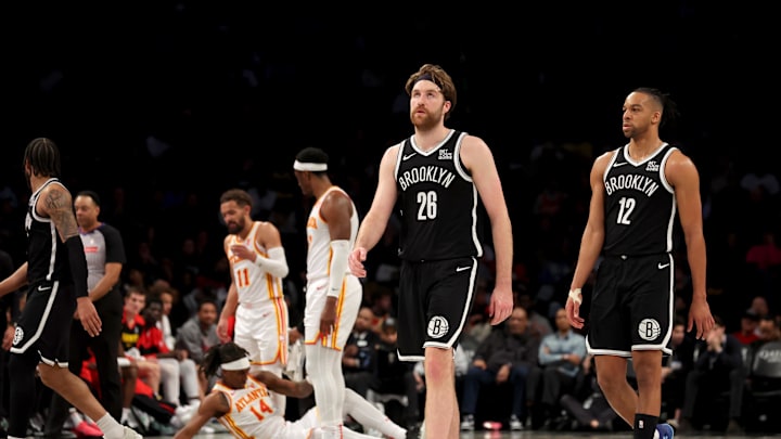 Apr 10, 2025; Brooklyn, New York, USA; Brooklyn Nets forward Drew Timme (26) reacts after being called for an offensive foul during the fourth quarter against the Atlanta Hawks at Barclays Center. Mandatory Credit: Brad Penner-Imagn Images