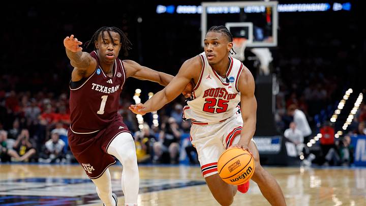 Mar 21, 2026; Oklahoma City, OK, USA; Houston Cougars guard Mercy Miller (25) drives to the hoop past Texas A&M Aggies guard Josh Holloway (1) during the second half of a second round game of the men's 2026 NCAA Tournament at Paycom Center. Mandatory Credit: Alonzo Adams-Imagn Images