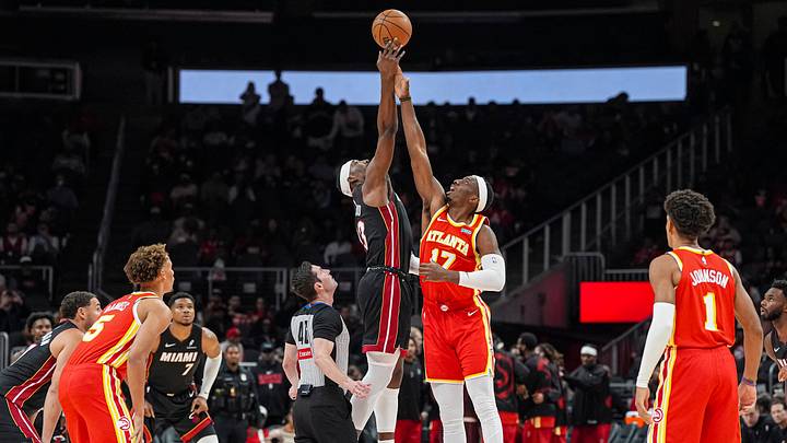 Oct 28, 2026; Atlanta, Georgia, USA; Miami Heat center Bam Adebayo (13) and Atlanta Hawks forward Onyeka Okongwu (17) contest the opening tip off during the first half at State Farm Arena. Mandatory Credit: Dale Zanine-Imagn Images Oct 28, 2026; Atlanta, Georgia, USA; Miami Heat center Bam Adebayo (13) and Atlanta Hawks forward Onyeka Okongwu (17) contest the opening tip off during the first half at State Farm Arena. Mandatory Credit: Dale Zanine-Imagn Images