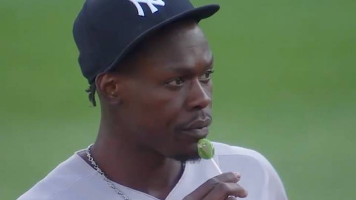 Yes Network cameras spotted Chisholm holding a blow pop while playing in the infield. Yes Network cameras spotted Chisholm holding a blow pop while playing in the infield.