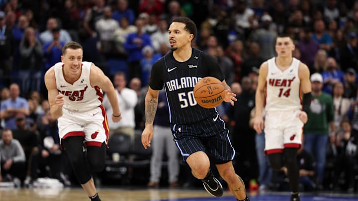 Dec 21, 2024; Orlando, Florida, USA; Orlando Magic guard Cole Anthony (50) controls the ball against the Miami Heat in the fourth quarter at Kia Center. Mandatory Credit: Nathan Ray Seebeck-Imagn Images