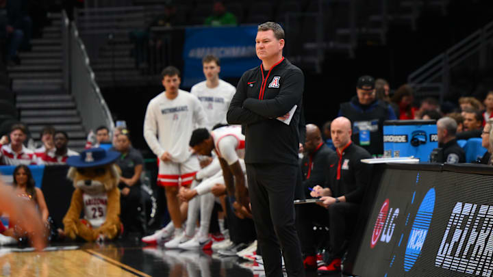 Mar 21, 2025; Seattle, WA, USA; Arizona Wildcats head coach Tommy Lloyd during the first half in the first round of the NCAA Tournament at Climate Pledge Arena. Mandatory Credit: Steven Bisig-Imagn Images