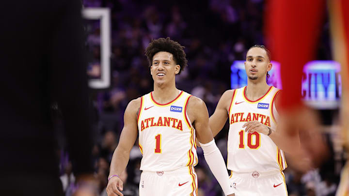 Nov 12, 2025; Sacramento, California, USA; Atlanta Hawks forward Jalen Johnson (1) and forward Zaccharie Risacher (10) as a timeout is called against the Sacramento Kings during the third quarter at Golden 1 Center. Mandatory Credit: Kelley L Cox-Imagn Images