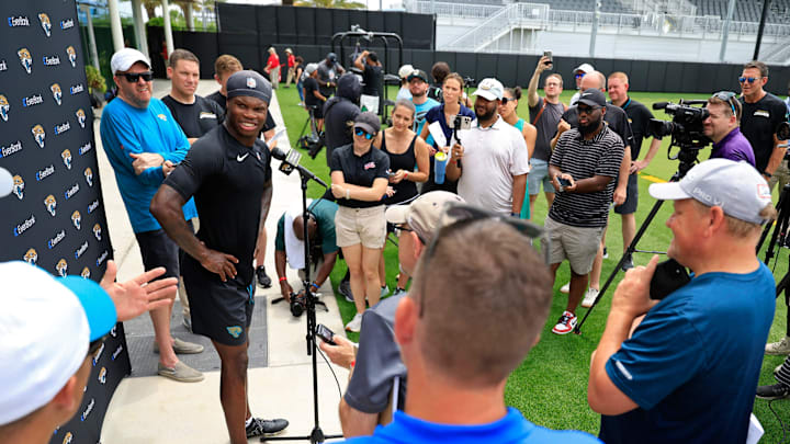 Jacksonville Jaguars wide receiver Travis Hunter (12) talks to members of the media during a rookie minicamp at Miller Electric Center Saturday, May 10, 2025 in Jacksonville, Fla. [Corey Perrine/Florida Times-Union]
