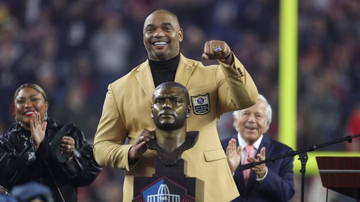 Oct 24, 2022; Foxborough, Massachusetts, USA; Former New England Patriot Richard Seymour receives a hall of fame ring during a game against the Chicago Bears at Gillette Stadium. Mandatory Credit: Paul Rutherford-Imagn Images
