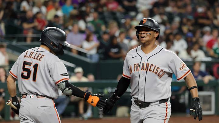 Jun 30, 2026; Phoenix, Arizona, USA; San Francisco Giants first baseman Rafael Devers (right) celebrates with Jung Hoo Lee after scoring against the Arizona Diamondbacks at Chase Field. Mandatory Credit: Mark J. Rebilas-Imagn Images Jun 30, 2026; Phoenix, Arizona, USA; San Francisco Giants first baseman Rafael Devers (right) celebrates with Jung Hoo Lee after scoring against the Arizona Diamondbacks at Chase Field. Mandatory Credit: Mark J. Rebilas-Imagn Images