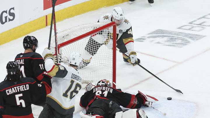 Jun 4, 2026; Raleigh, North Carolina, USA; Vegas Golden Knights left wing Ivan Barbashev (49) shoots the puck against Carolina Hurricanes goaltender Frederik Andersen (31) during the third period in game two of the 2026 Stanley Cup Final at Lenovo Center. Mandatory Credit: Nathan Ray Seebeck-Imagn Images