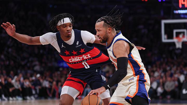Mar 22, 2026; New York, New York, USA; New York Knicks guard Jalen Brunson (11) drives to the basket as Washington Wizards guard Bilal Coulibaly (0) defends during the first half at Madison Square Garden. Mandatory Credit: Vincent Carchietta-Imagn Images