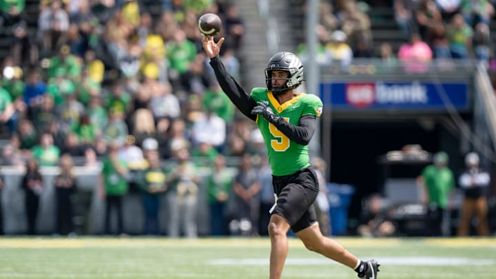 Fighting Ducks quarterback Dante Moore throws out a pass as the Fighting Ducks face off against Mighty Oregon in the Oregon Ducks spring game on April 26, 2025, at Autzen Stadium in Eugene.