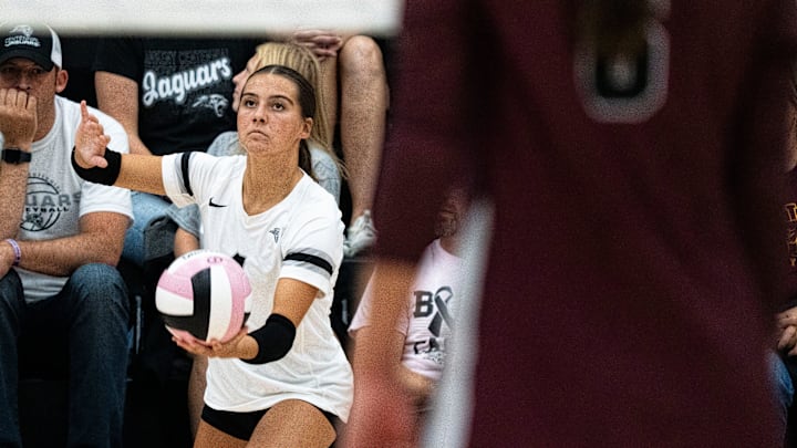 Ankeny Centennial's Nora Bockes (4) serves the ball during a tournament at Ankeny Centennial High School on Aug. 30, 2025, in Ankeny.