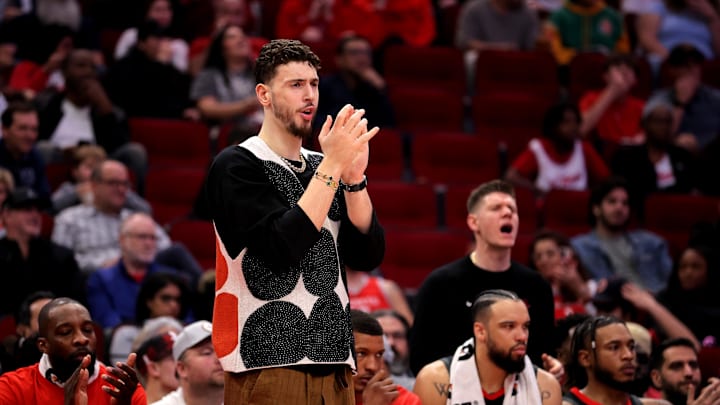 Feb 1, 2025; Houston, Texas, USA; Houston Rockets center Alperen Sengun (28) reacts to a play while on the bench against the Brooklyn Nets during the fourth quarter at Toyota Center. Mandatory Credit: Erik Williams-Imagn Images