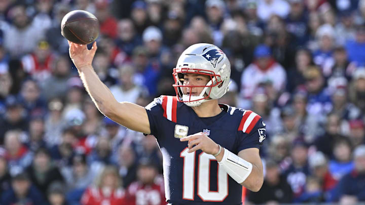 Nov 2, 2025; Foxborough, Massachusetts, USA; New England Patriots quarterback Drake Maye (10) passes against the Atlanta Falcons during the first half at Gillette Stadium. Mandatory Credit: Eric Canha-Imagn Images