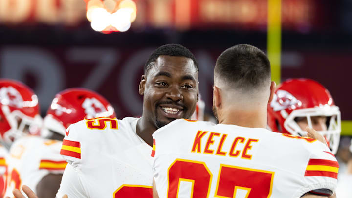 Aug 9, 2025; Glendale, Arizona, USA; Kansas City Chiefs defensive tackle Chris Jones (95) with tight end Travis Kelce (87) against the Arizona Cardinals during a preseason NFL game at State Farm Stadium. Mandatory Credit: Mark J. Rebilas-Imagn Images