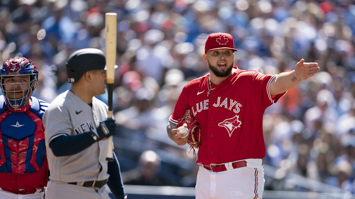 Jun 18, 2022; Toronto, Ontario, CAN; Toronto Blue Jays starting pitcher Alek Manoah (6) talks with the home plate umpire regarding New York Yankees catcher Jose Trevino (39) being hit with a pitch during the fourth inning at Rogers Centre. Mandatory Credit: Nick Turchiaro-Imagn Images