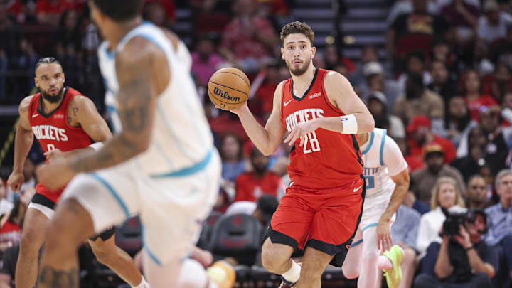 Oct 23, 2024; Houston, Texas, USA; Houston Rockets center Alperen Sengun (28) drives with the ball after a rebound during the second quarter against the Charlotte Hornets at Toyota Center. Mandatory Credit: Troy Taormina-Imagn Images