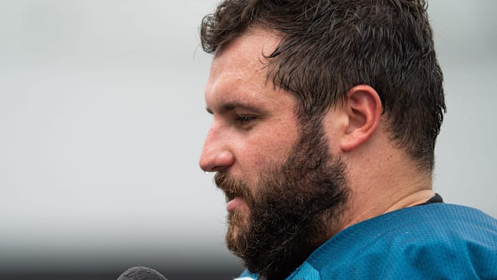 Sweat drips of the end of Jacksonville Jaguars center Robert Hainsey (73) while being interviewed after the Jaguar’s 12th NFL training camp session at the Miller Electric Center, Thursday, Aug. 7, 2025, in Jacksonville, Fla. [Doug Engle/Florida Times-Union]