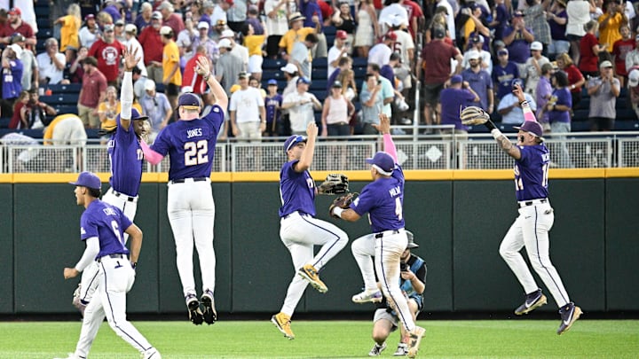 Jun 14, 2025; Omaha, Neb, USA; The LSU Tigers team celebrates the win against the Arkansas Razorbacks at Charles Schwab Field. Mandatory Credit: Steven Branscombe-Imagn Images Jun 14, 2025; Omaha, Neb, USA; The LSU Tigers team celebrates the win against the Arkansas Razorbacks at Charles Schwab Field. Mandatory Credit: Steven Branscombe-Imagn Images
