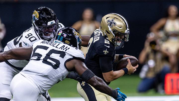 Aug 15, 2026; New Orleans, Louisiana, USA; New Orleans Saints quarterback Spencer Rattler (2) scrambles from the pocket and fumbles the ball against Jacksonville Jaguars linebacker Yasir Abdullah (56) during the first half at Caesars Superdome. Mandatory Credit: Stephen Lew-Imagn Images Aug 15, 2026; New Orleans, Louisiana, USA; New Orleans Saints quarterback Spencer Rattler (2) scrambles from the pocket and fumbles the ball against Jacksonville Jaguars linebacker Yasir Abdullah (56) during the first half at Caesars Superdome. Mandatory Credit: Stephen Lew-Imagn Images