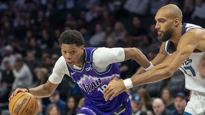 Mar 18, 2026; Minneapolis, Minnesota, USA; Utah Jazz guard Ace Bailey (19) drives to the basket past Minnesota Timberwolves center Rudy Gobert (27) in the second half at Target Center. Mandatory Credit: Jesse Johnson-Imagn Images