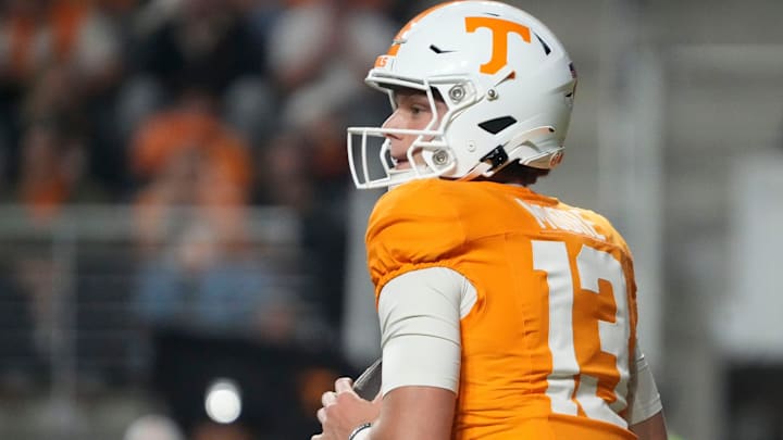 Tennessee quarterback Gaston Moore (13) looks for an open receiver during an NCAA college football game against Mississippi State on Saturday, Nov. 9, 2024, in Knoxville, Tenn.