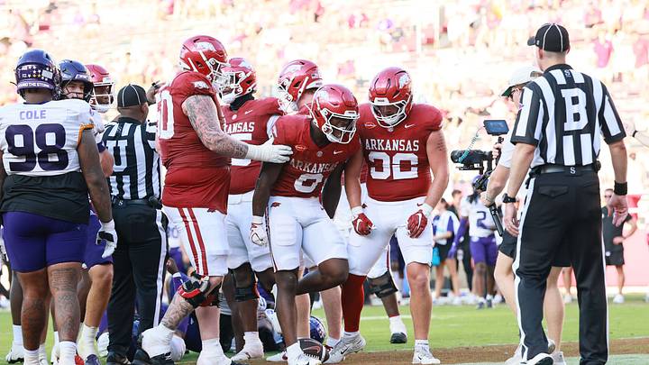 Sep 5, 2026; Fayetteville, Arkansas, USA;  Arkansas Razorbacks running back Braylen Russell (0) celebrates after scoring a touchdown during the fourth quarter against the North Alabama Lions at Donald W. Reynolds Razorback Stadium.  Mandatory Credit: Nelson Chenault-Imagn Images
