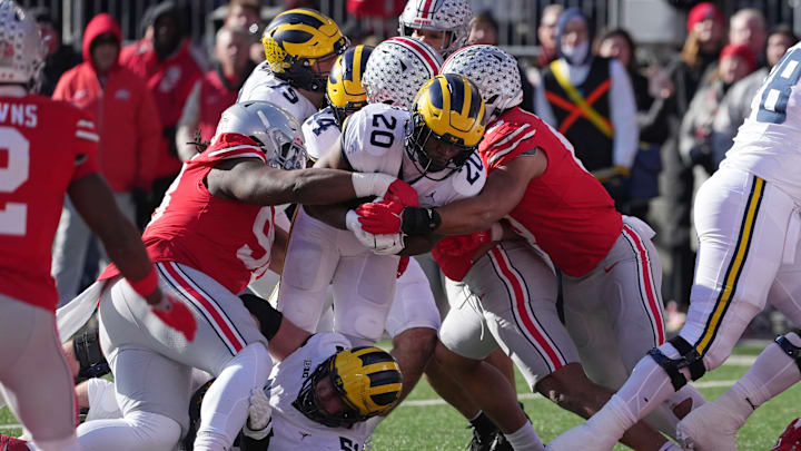 #20 Kalel Mullings rushing through contact in 13-10 win against Ohio State Buckeyes, Nov. 30th, 2024