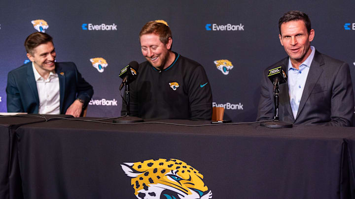 Jacksonville Jaguars General Manager James Gladstone, left, laughs with Head Coach Liam Coen, center, as explained what he was bringing to the table during a press conference Monday morning February 24, 2025 at the Miller Electric Center in Jacksonville, Fla. as Head Coach Liam Coen, right, listened as Jacksonville Jaguars Executive Vice President of Football Operations Tony Boselli cracked a joke during a press conference introducing Gladstone. [Doug Engle/Florida Times-Union]2025