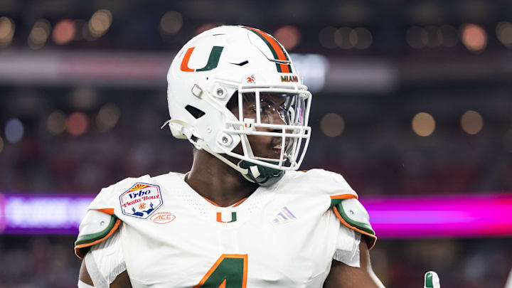 Jan 8, 2026; Glendale, AZ, USA; Miami Hurricanes defensive lineman Rueben Bain Jr. (4) against the Mississippi Rebels during the 2026 Fiesta Bowl and semifinal game of the College Football Playoff at State Farm Stadium. Mandatory Credit: Mark J. Rebilas-Imagn Images Jan 8, 2026; Glendale, AZ, USA; Miami Hurricanes defensive lineman Rueben Bain Jr. (4) against the Mississippi Rebels during the 2026 Fiesta Bowl and semifinal game of the College Football Playoff at State Farm Stadium. Mandatory Credit: Mark J. Rebilas-Imagn Images