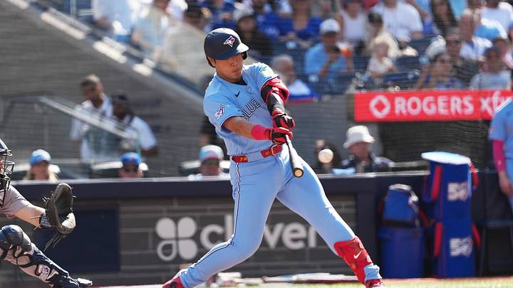 Aug 15, 2026; Toronto, Ontario, CAN; Toronto Blue Jays third baseman Kazuma Okamoto (7) hits a single against the New York Yankees during the sixth inning at Rogers Centre. Mandatory Credit: Nick Turchiaro-Imagn Images
