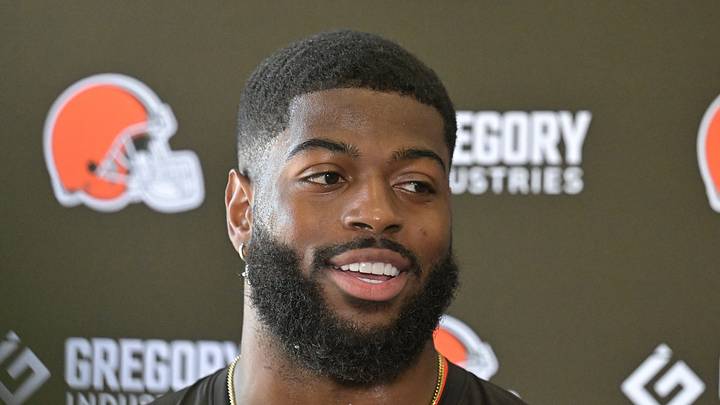 Cleveland Browns defensive end Jared Verse (8) talks to the media