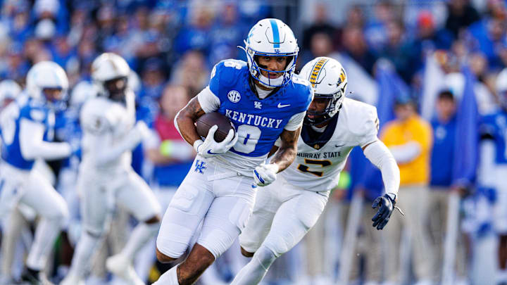 Nov 16, 2024; Lexington, Kentucky, USA; Kentucky Wildcats wide receiver Dane Key (6) runs the ball during the first quarter against the Murray State Racers at Kroger Field. Mandatory Credit: Jordan Prather-Imagn Images