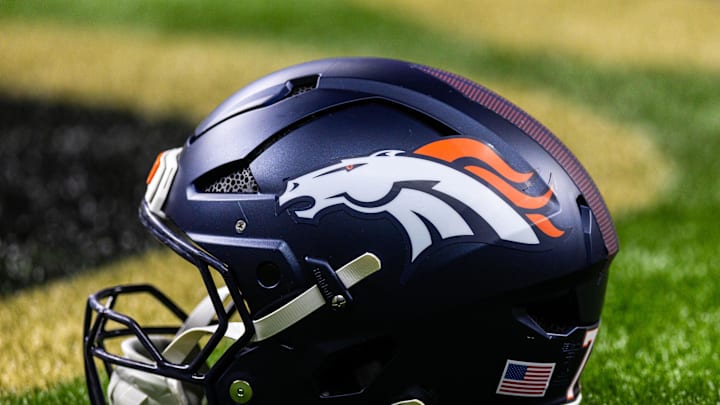 Aug 23, 2025; New Orleans, Louisiana, USA; Detailed view of the Denver Broncos helmet against the New Orleans Saints during warmups at Caesars Superdome. Mandatory Credit: Stephen Lew-Imagn Images